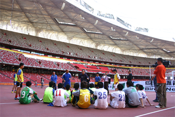 Renzo Ulivieri and Gigi di Biagio executing a youth football development with customized laboratories according to the Beijing football association BFA, President Yang Jung Sheng, and AIAC Renzo Ulivieri signed an official 2010 2014 cooperation program to develop the Beijing and China football, the partnership program included youth football coaches training, youth football training, school teacher programs and support the yout Beijing team in their Chinese championship, during the signing ceremony was present the Ambassador of Italy Riccardo Sessa, Shine Liu D&S president, Christian Caballero WBN president and the former player Gigi di Biagio