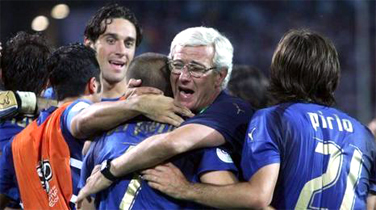 The AIAC coach Marcello Lippi with his players after the Grosso's penalty the Italian national team players run to celebrate... they are the new World Champions and Italy is in the very top of the world, thanks to their football soccer school, Italian football soccer school to the world thanks to WBN and AIAC - the Italian football soccer association of coaches - the Italian football soccer school offers to the international players and teams the World Champions technical and tactical training to the USA soccer teams, Canada soccer players, UAE soccer league, Saudi Arabia teams, Australia teams and soccer players. We offer also customized training for soccer lovers as begineers camps, young soccer camps, girls football soccer training and professional Italian soccer Coaches for your team, our Italian soccer school offers the most prestige and winner Football Soccer coach camps and training in the world ready to coach in your country and become a Champion in your league